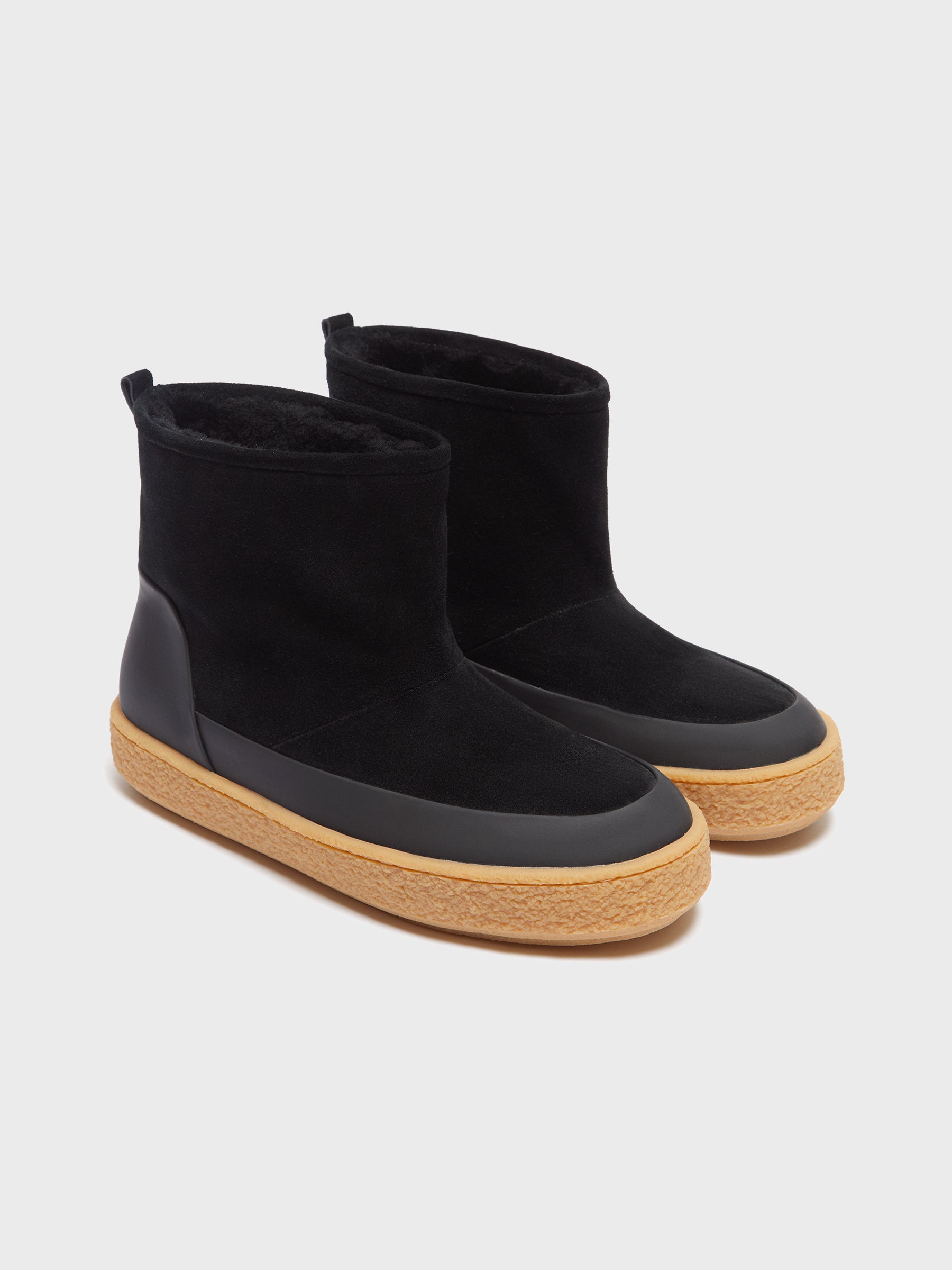 Shearling slip-on boots